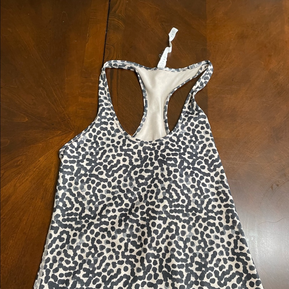 Leopard print Lululemon tank top.